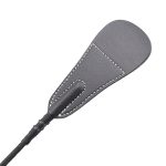 a black fan-shaped leather riding crop