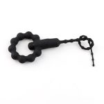 a black silicone urethral dilator